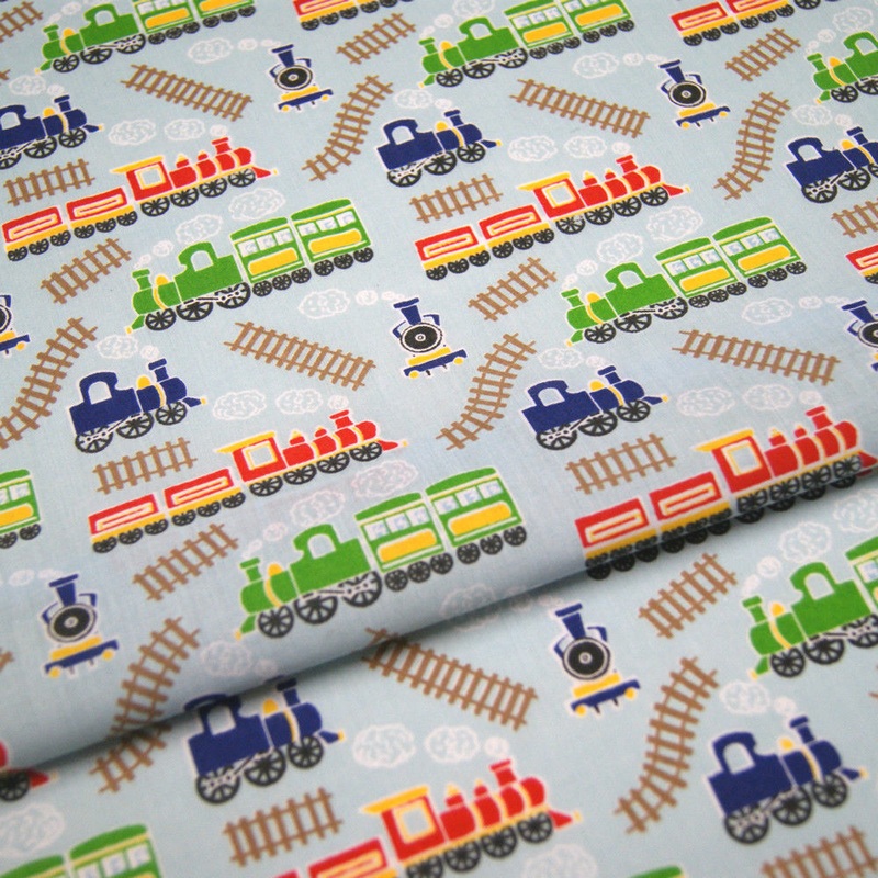 1 Metre Polycotton Train Fabric on Baby Blue Background – 45 Width T211