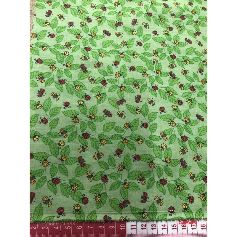 Polycotton Ladybirds on Green Leaves Background 45 Width T204