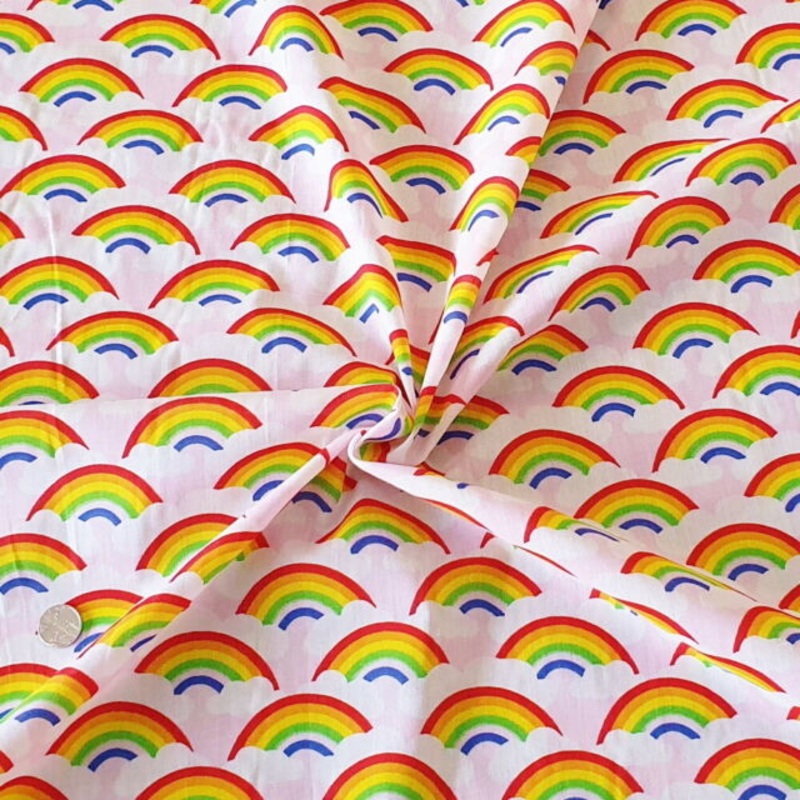 1 Metre Rainbows and Clouds Polycotton Fabric Pink Background x 43