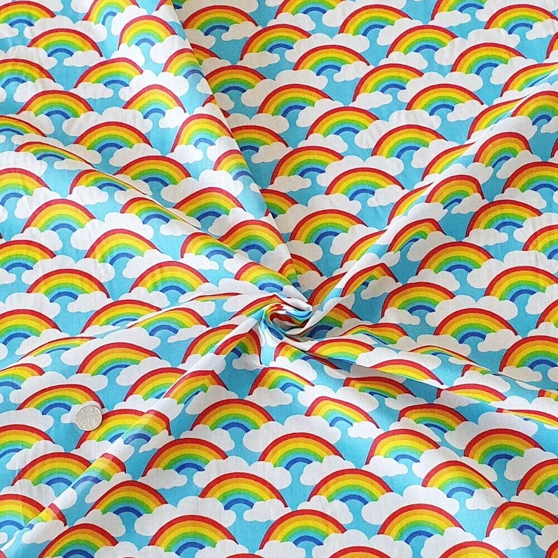 1 Metre Rainbows and Clouds Polycotton Fabric Sky Blue Background x 43