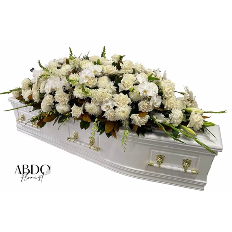 All White Seasonal Casket Flowers