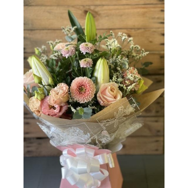 Pastel Hand tied bouquet made with the finest flowers
