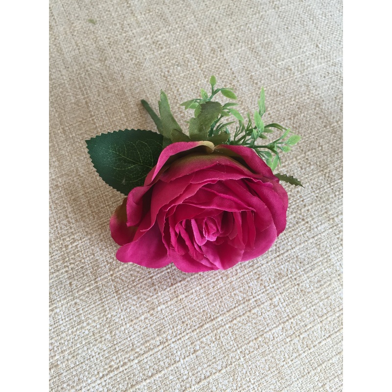 Raspberry pink silk wedding buttonhole / boutonniere.