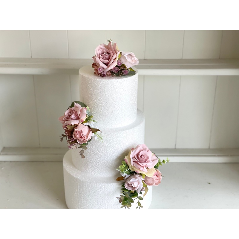Dusky pink and mauve silk flower cake decoration
