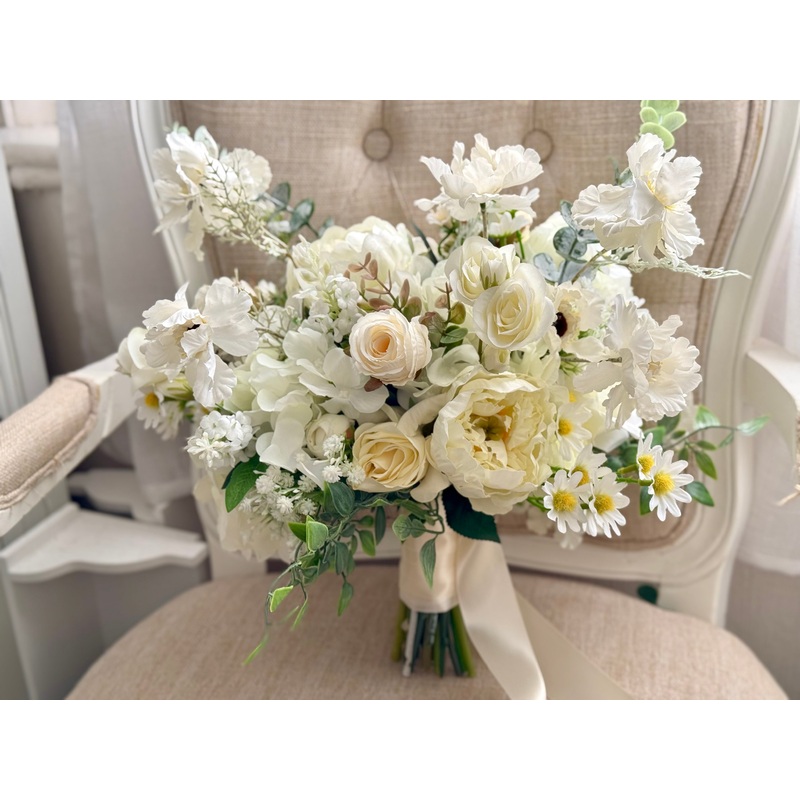 Elegant white and ivory artificial wedding flowers. Romantic country garden bridal bouquet.