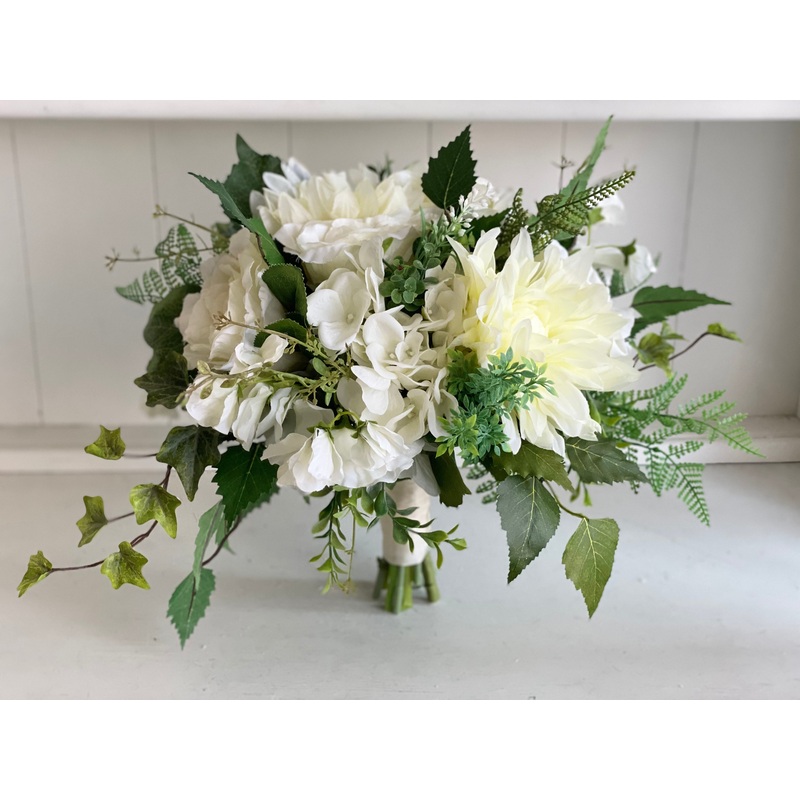 Ivory and green wedding bouquet and matching buttonhole