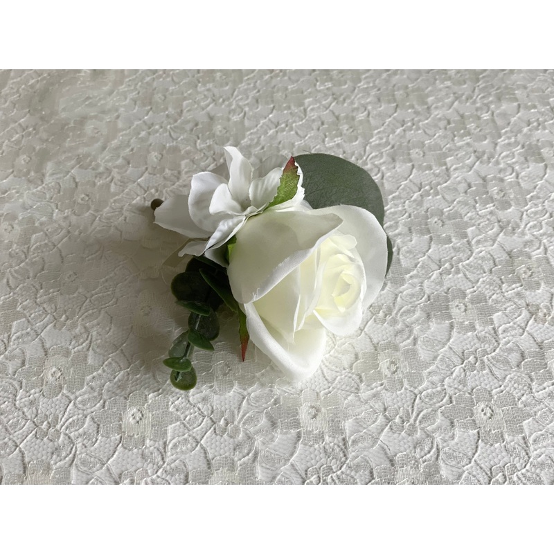 Ivory rose, white hydrangea and eucalyptus wedding buttonhole