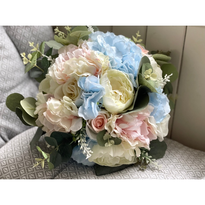 Pale blue, pink and ivory silk wedding bouquet.