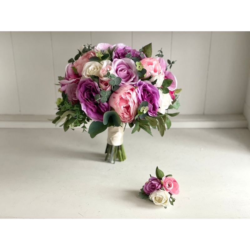 Pink, lilac and ivory wedding bouquet and matching items.