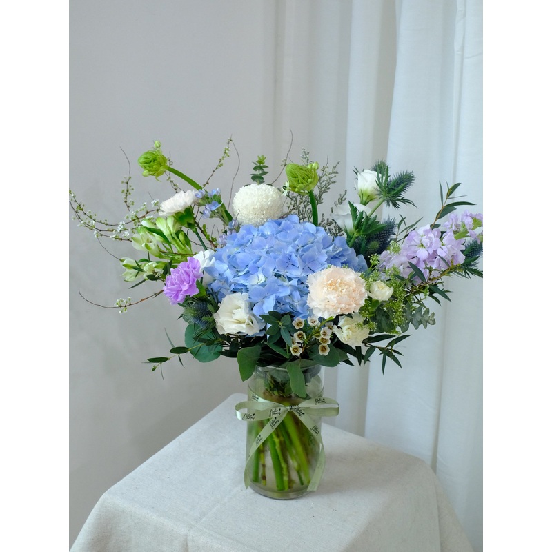 Serene in a Vase – Blue, Lilacs and White