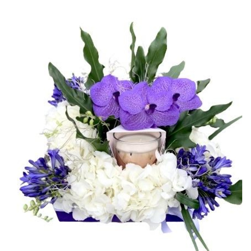 Purple Flower Box with a Candle
