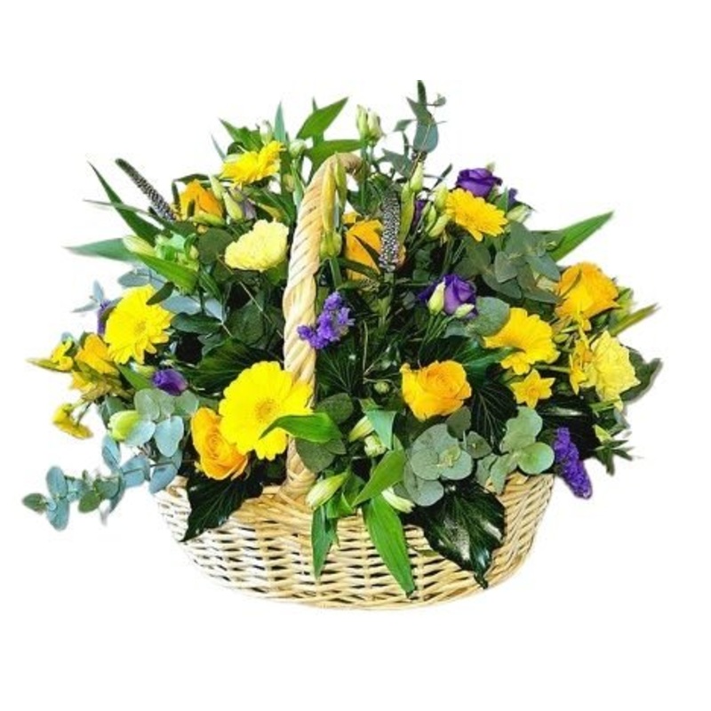 A Basket of Yellow Flowers with a Purple Touch
