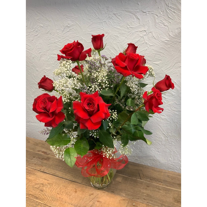 Classic Dozen Roses in a vase with Babies Breath