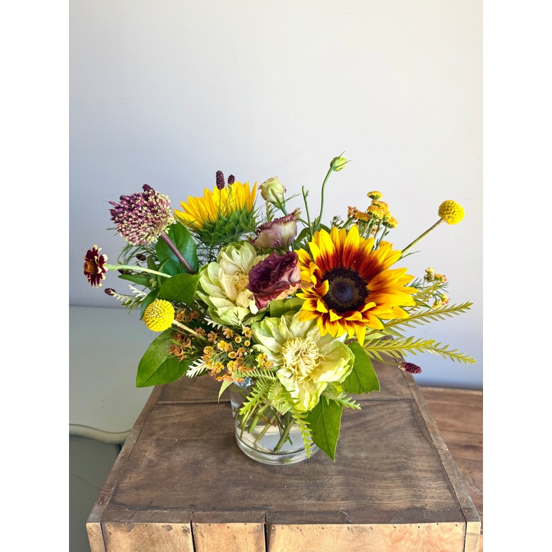 Fallin’ in Love    -Fall floral arrangement in a 5″ clear cylinder