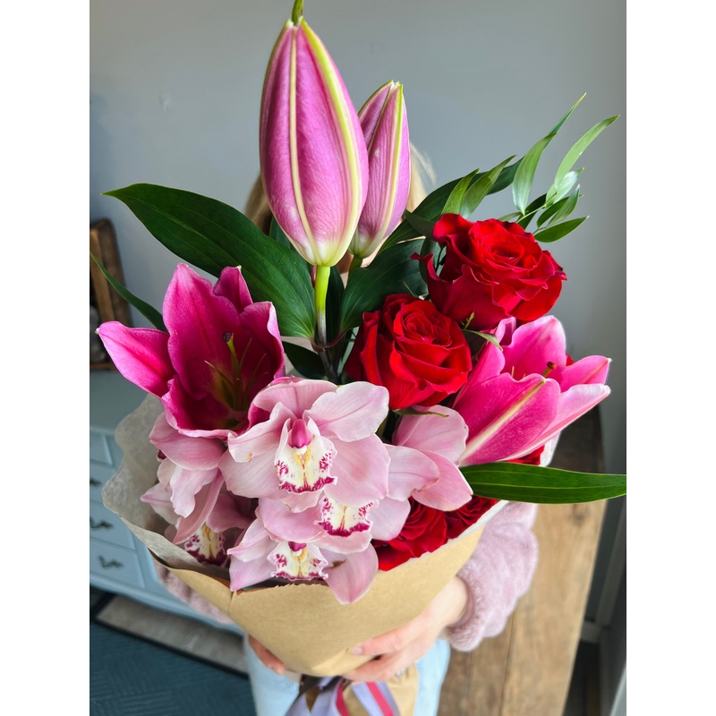 Unchained Melody  -Wrapped Blooms with Ribbon – W/out Vase – $150-Red Roses & Cymbidium Orchids  – $150