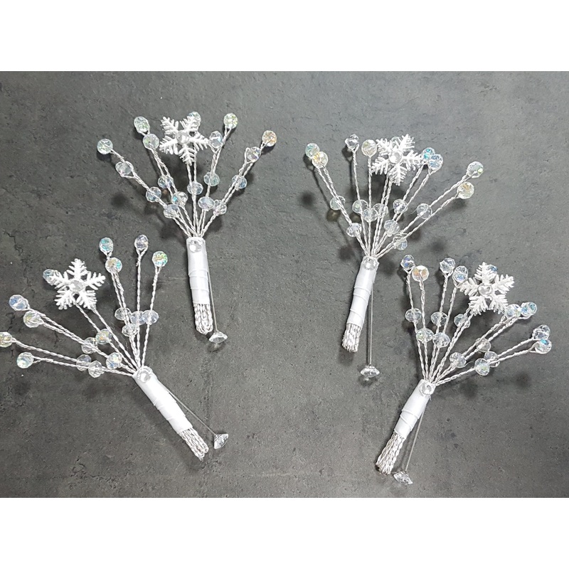 Snowflake buttonhole with Ab crystals  for a Winter wedding by Crystal wedding uk